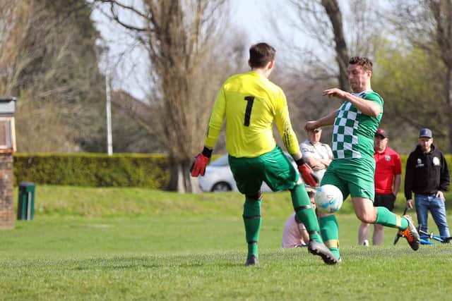 Mob's Harry Potter  opens the scoring against Portchester Rovers.
Picture: Chris Moorhouse