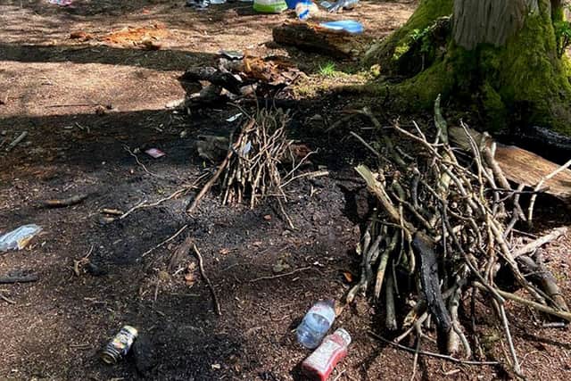 Caption: Police have threatened to destroy all these items abandoned by a large group of motorcyclists who fled after being caught breaking lockdown laws to have a picnic in woodland at Dunsbury Hill. Photo: Havant police