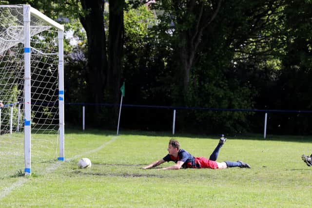 Zac Willett watches his second goal go in against Liphook. Picture: Sam Stephenson