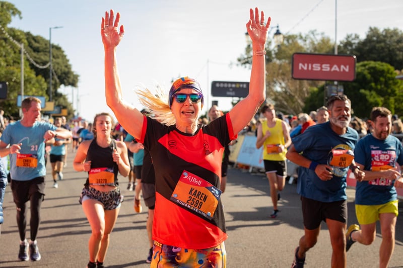 Pictured is: A runner crossing the finish line.