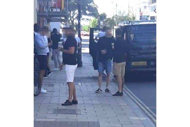 People drinking outside a restaurant on Friday night, in Osborne Road in Southsea