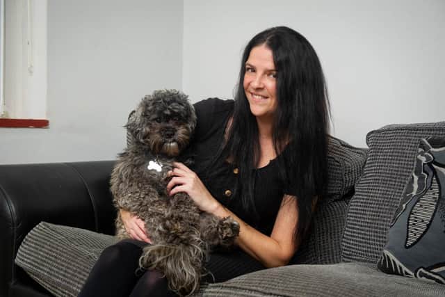 Charlene Maines and her dog, Charlie at her home in Rowlands Castle. 
Picture: Habibur Rahman