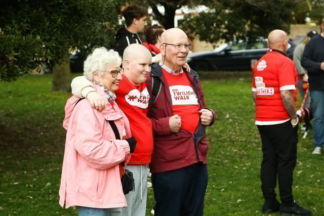 Charity walkers wait for the Portsmouth twilight walk for brain cancer to begin at Canoe Lake, Southsea on Saturday the 22nd of March 2025