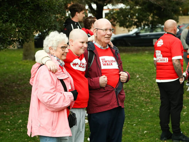 Charity walkers wait for the Portsmouth twilight walk for brain cancer to begin at Canoe Lake, Southsea on Saturday the 22nd of March 2025
