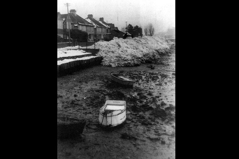 A city council lorry dumping snow from Portsmouth streets in Portcreek from Tudor Crescent, Cosham, December 1962.