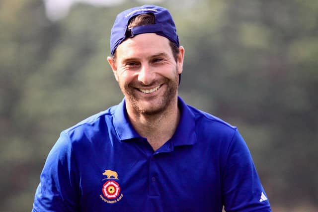 Hayling’s Toby Burden is all smiles after securing the point that gave Hampshire a draw in their South East League match to secure the South Division title against Surrey, at Hindhead. Picture: Andrew Griffin