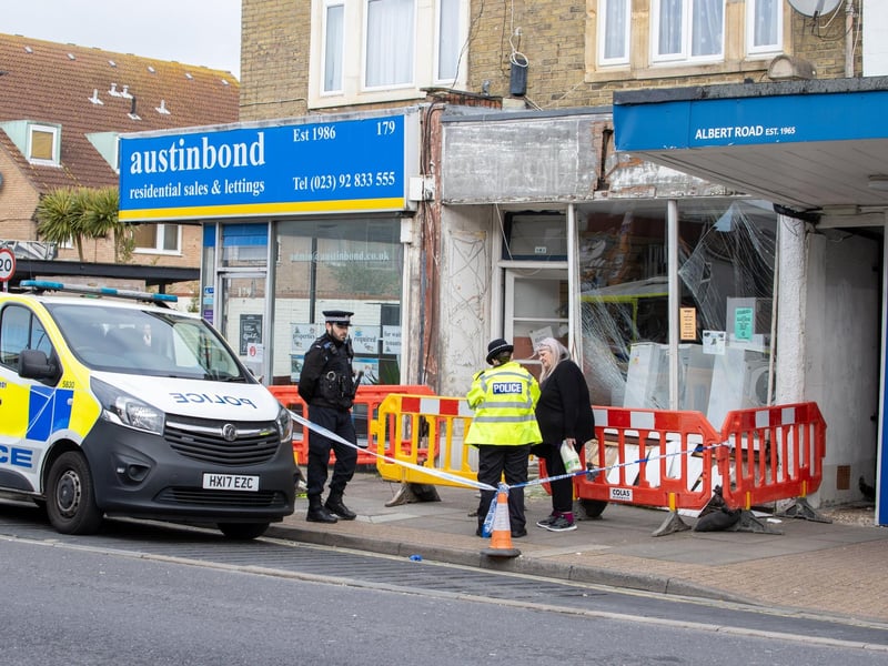 A police car crashed into the front of a shop on Albert Road.Pictured - The resulting damage and police on scenePhotos by Alex Shute