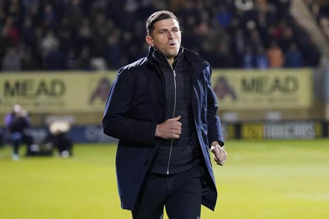 John Mousinho has called on Pompey's players not to be distracted by Reading supporter protests at Saturday's game. Picture: Jason Brown/ProSportsImages