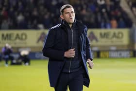 John Mousinho has called on Pompey's players not to be distracted by Reading supporter protests at Saturday's game. Picture: Jason Brown/ProSportsImages