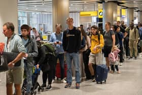 Queues at London Heathrow Airport.