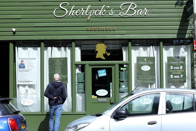 The bar is stylish and filled with Sherlock Holmes memorabilia.