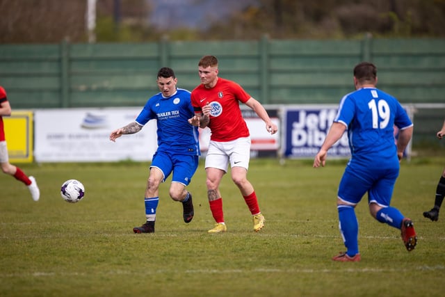 Action from Gosport Town's 4-0 victory over Lee Rangers (blue kit) in the Portsmouth & District FA Trophy final at Cams Alders. Picture: Alex Shute