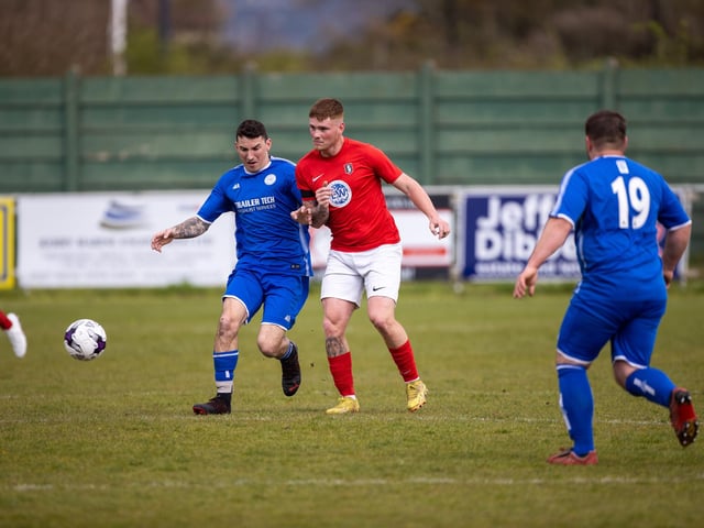 Action from Gosport Town's 4-0 victory over Lee Rangers (blue kit) in the Portsmouth & District FA Trophy final at Cams Alders. Picture: Alex Shute