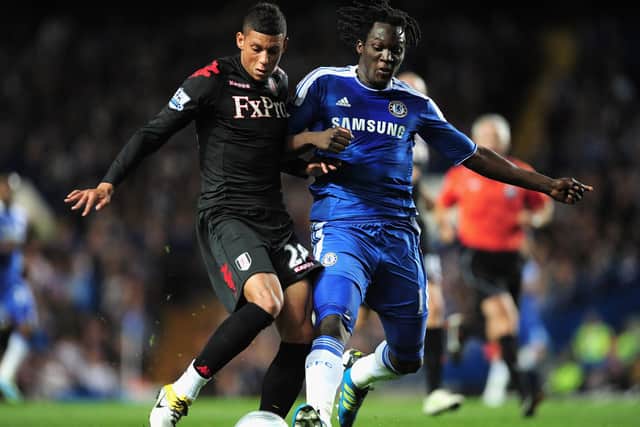 Matt Briggs, left, locked in battle with former Chelsea striker Romelu Lukaku during his days at Fulham. Picture: Jamie McDonald/Getty Images