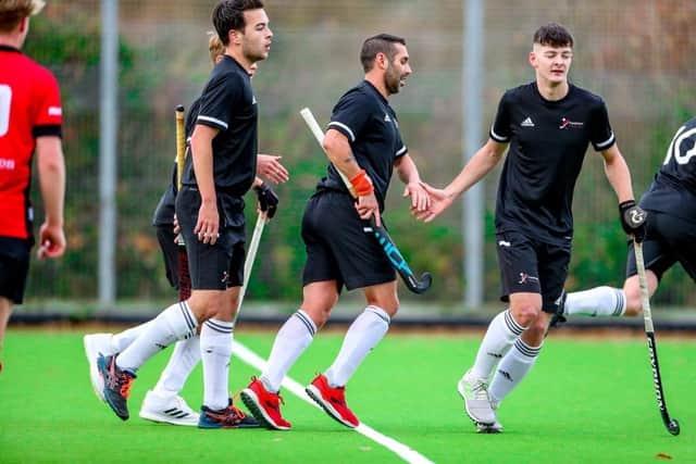 Niall Stott is congratulated after his goal. Picture: Rupert (Woven Carbon Products)