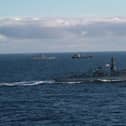 HMS Portland (foreground) tracks Admiral Gorshkov and tanker in the background, January 2023. Picture: Royal Navy