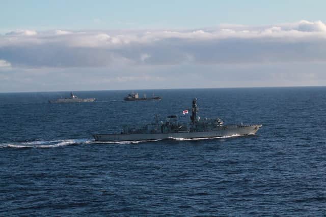 HMS Portland (foreground) tracks Admiral Gorshkov and tanker in the background, January 2023. Picture: Royal Navy