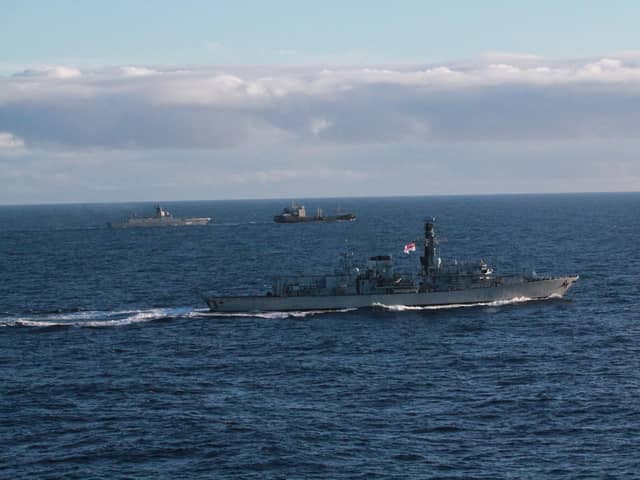 HMS Portland (foreground) tracks Admiral Gorshkov and tanker in the background, January 2023. Picture: Royal Navy