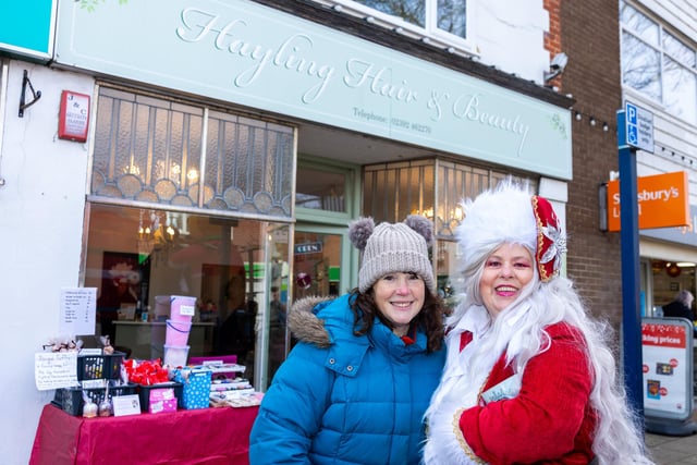 Locals braved the cold to celebrate the start of the Christmas festivites with a street party on Hayling Island on Saturday afternoon.

Pictured - Sahron Cogger, raising money for The Lilly Foundation  and Julie Kirby (Santas Daughter) raising money for the RNLI.

Photos by Alex Shute