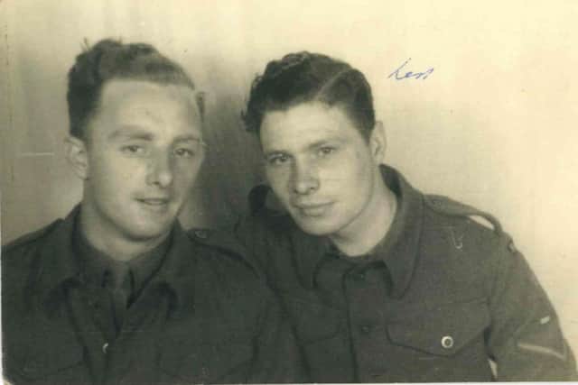 Len Gibbon (right), who completed a 104-mile static cycling challenge to mark the 76th anniversary of the Normandy landings. Photo: Care for Veterans/PA Wire