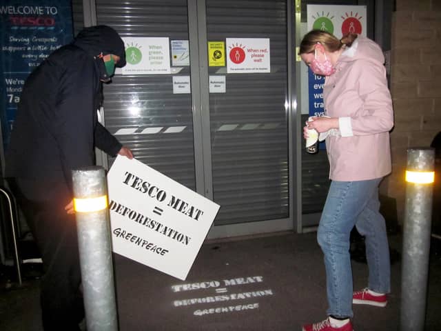 A message stencilled in yellow colour chalk, reading ‘Tesco meat = deforestation’ appears outside the supermarket’s branch in Crosspool as part of a nationwide protest at 270 stores, including two in Portsmouth. Picture: Greenpeace