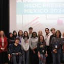 Arlo poses for a photo with students and faculty who also went on the Mexico Turing Trip.