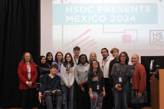 Arlo poses for a photo with students and faculty who also went on the Mexico Turing Trip.
