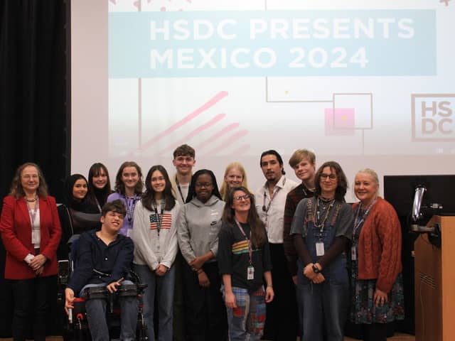 Arlo poses for a photo with students and faculty who also went on the Mexico Turing Trip.