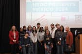 Arlo poses for a photo with students and faculty who also went on the Mexico Turing Trip.