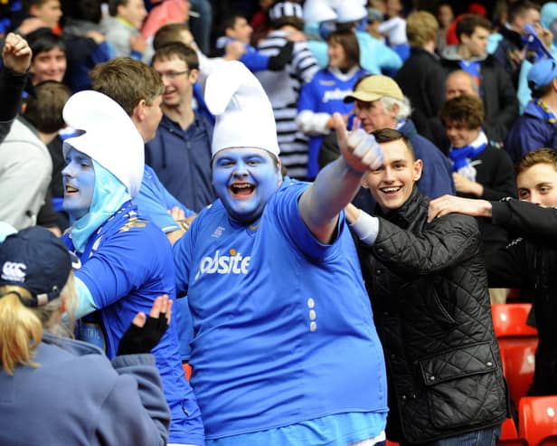 Bet you didn't know the Smurfs were big Pompey fans!Picture: Allan Hutchings (121503-012)