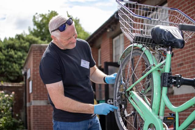 A volunteer at another Repair Cafe branch.
Pictured - Sean Duffy, an Inspector with Hampshire Constabulary gave up his Saturday to volunteer at the Repair Cafe, helping to fix broken bikes.
Photos by Alex Shute