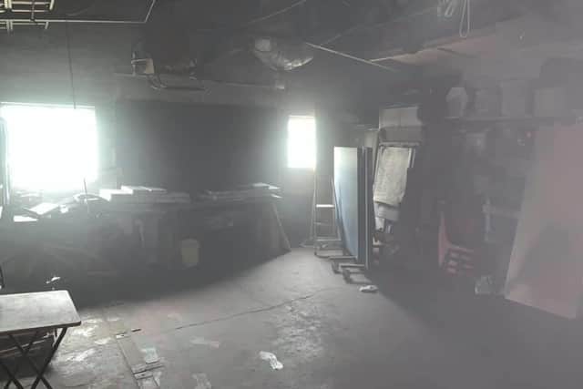 The smoke-filled room where the camping equipment was stored.