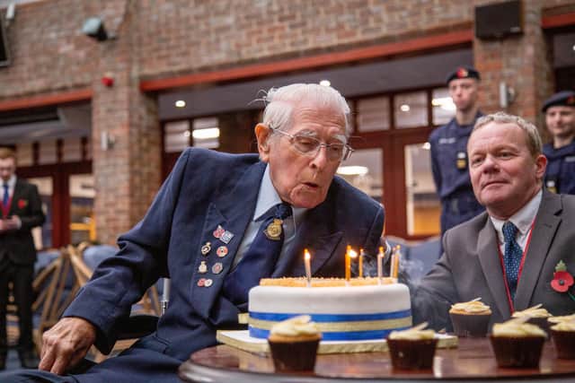 World War Two veteran Bernard Beckett visits HMS Collingwood to celebrate his birthday on Monday 31st October 2022
Pictured: Bernard Beckett blowing out the candles of his cake at HMS Collingwood, Gosport
Picture: Habibur Rahman