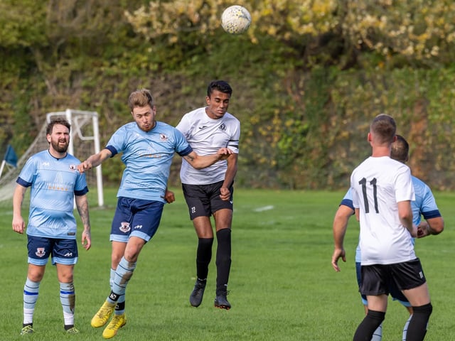 Portchester Rovers (blue) v Pompey Dynamos. Picture: Mike Cooter