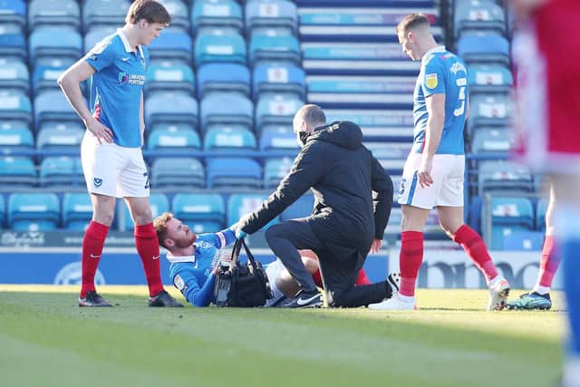 Tom Naylor receiving treatment