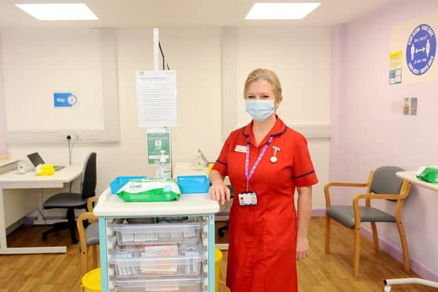 Stephanie Clark, vaccination lead and head of quality and professions, in one of the vaccination bays. Picture: Sarah Standing (310121-1823)