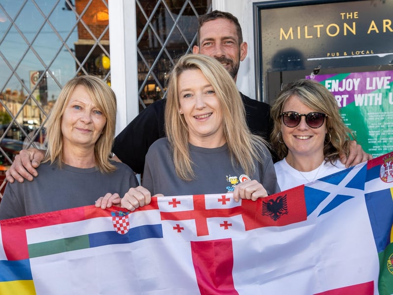 England fans gathered at the Milton Arms in Portsmouth on Sunday evening to watch England's opening game against Serbia in Euro 2024.Pictured - Tracey Ford, Landlady Christina Sloan, Landlord Dan Smith and fan Gemma WilliamPhotos by Alex Shute