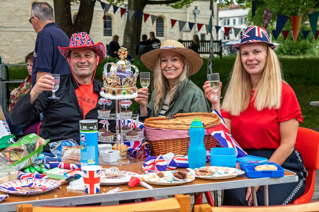 Outdoor fun at the Portsmouth Cathedral jubilee street party. Pictured: Adam Knight (48), Lisa Houghton (46) and Kathy Knight (47). Picture: Mike Cooter (050622)