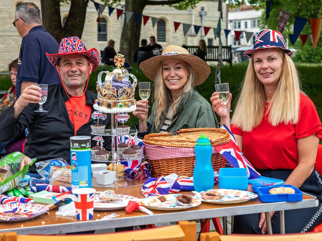 Outdoor fun at the Portsmouth Cathedral jubilee street party. Pictured: Adam Knight (48), Lisa Houghton (46) and Kathy Knight (47). Picture: Mike Cooter (050622)
