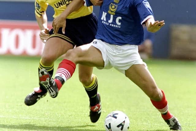 Pompey's John Aloisi battles with Oxford United's Phil Gilchrist in their First Division encounter in September 1998. Picture: Clive Mason /Allsport