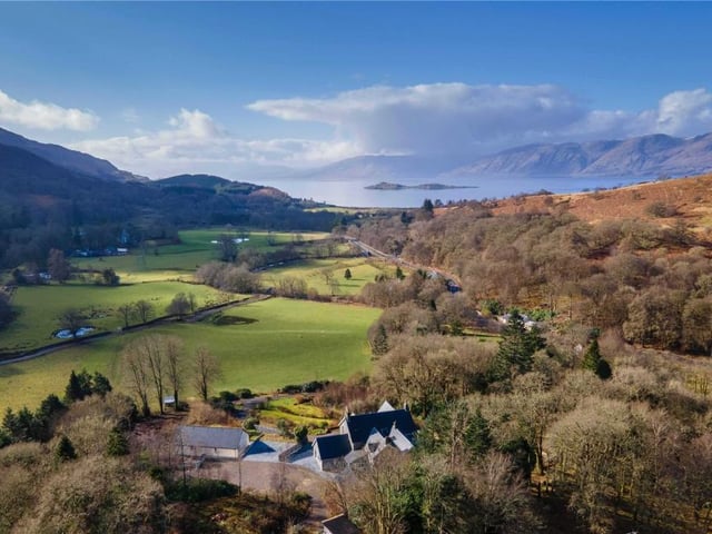 Aerial view of property and surrounding countryside.