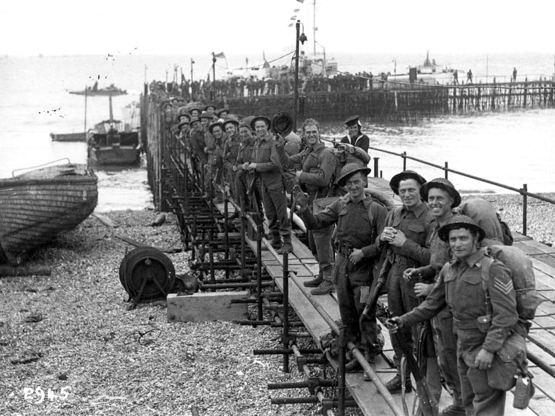 Royal engineers embark from Beach pier, June 1944.