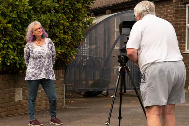 Nikki Shepherd of the Hayling Lions being filmed by Mike Beel for the Stay Home, Stay Safe video they created for senior citizens. Picture by Joe Bogar Shaped by Light