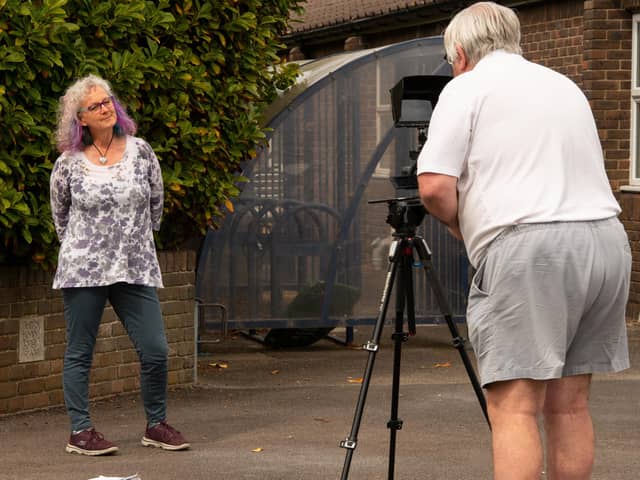 Nikki Shepherd of the Hayling Lions being filmed by Mike Beel for the Stay Home, Stay Safe video they created for senior citizens. Picture by Joe Bogar Shaped by Light