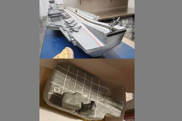 Above, the HMS Queen Elizabeth cake made by 3D Cakes at Roseburn, Edinburgh, for the Queen at the aircraft carrier's commissioning ceremony in Portsmouth. Below, the version made for Maxwell's eighth birthday by a person recommended to his dad Shane Mason. Pictures: Greg Macvean/Shane Mason