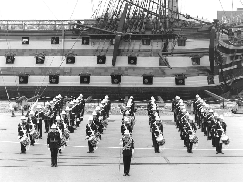 Royal Marine Band of the Commander in Chief Naval Home Command alongside HMS Victory in Her Majesty's Naval Base, Portsmouth, 1982. The News PP5161