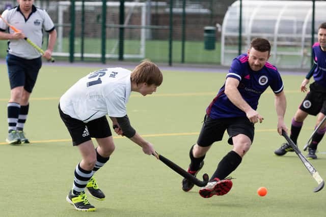 Portsmouth's Jon Farmer, right, in action against Gosport. Picture: Duncan Shepherd