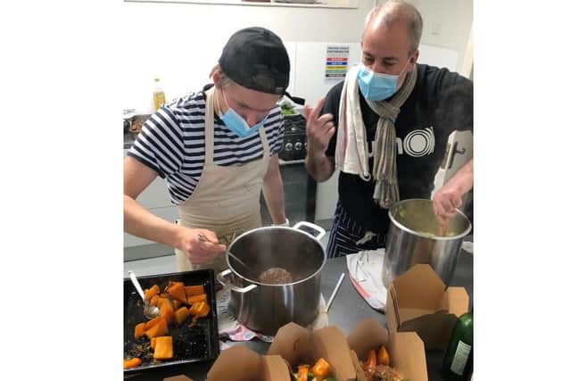 St M's Events in Paulsgrove has been handing out free meatballs to the community on Meatball Mondays. Pictured: Louis Coward, London chef usually serving food at Soho House, with volunteer Justin Robbins