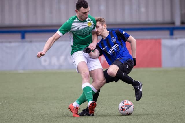 Clanfield (blue/black) v Moneyfields. Picture by Alex Shute