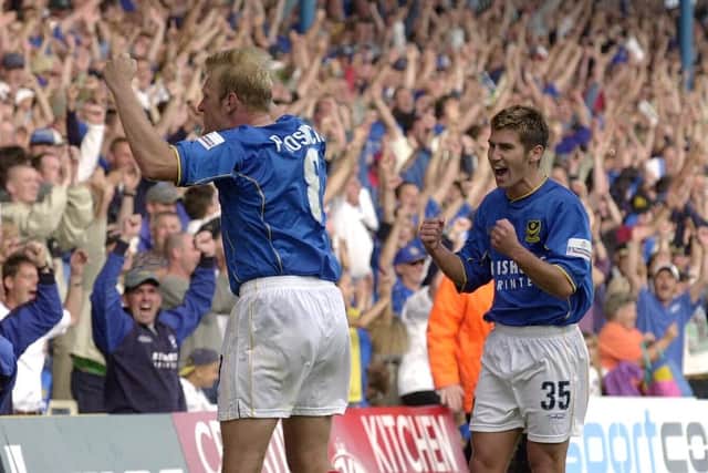 Robert Prosinecki celebrates with Pompey fans along with Mark Burchill after Alessandro Zamperini's stoppage-time winner against Gillingham in September 2001